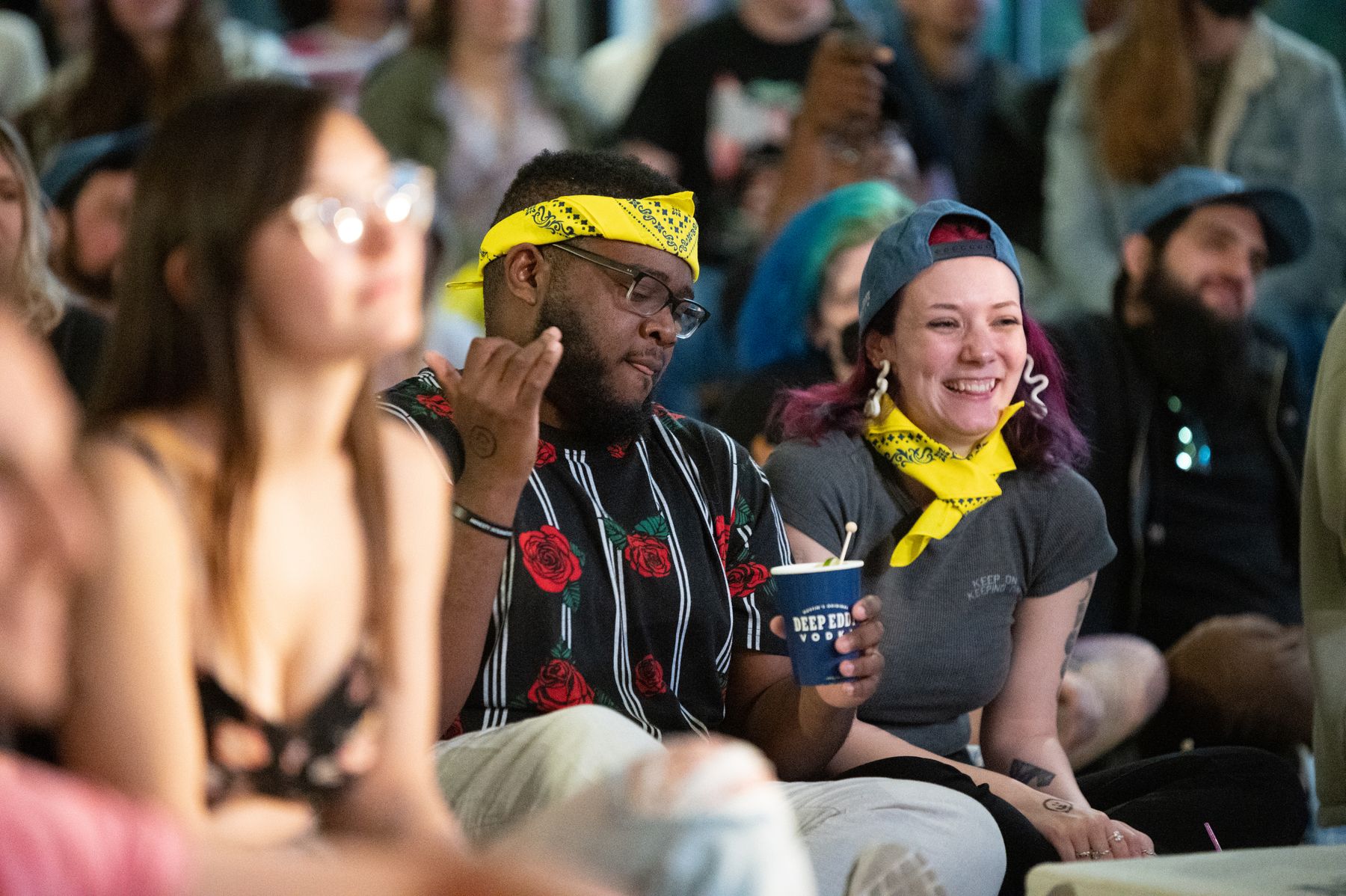 Guests laughing in the crowd