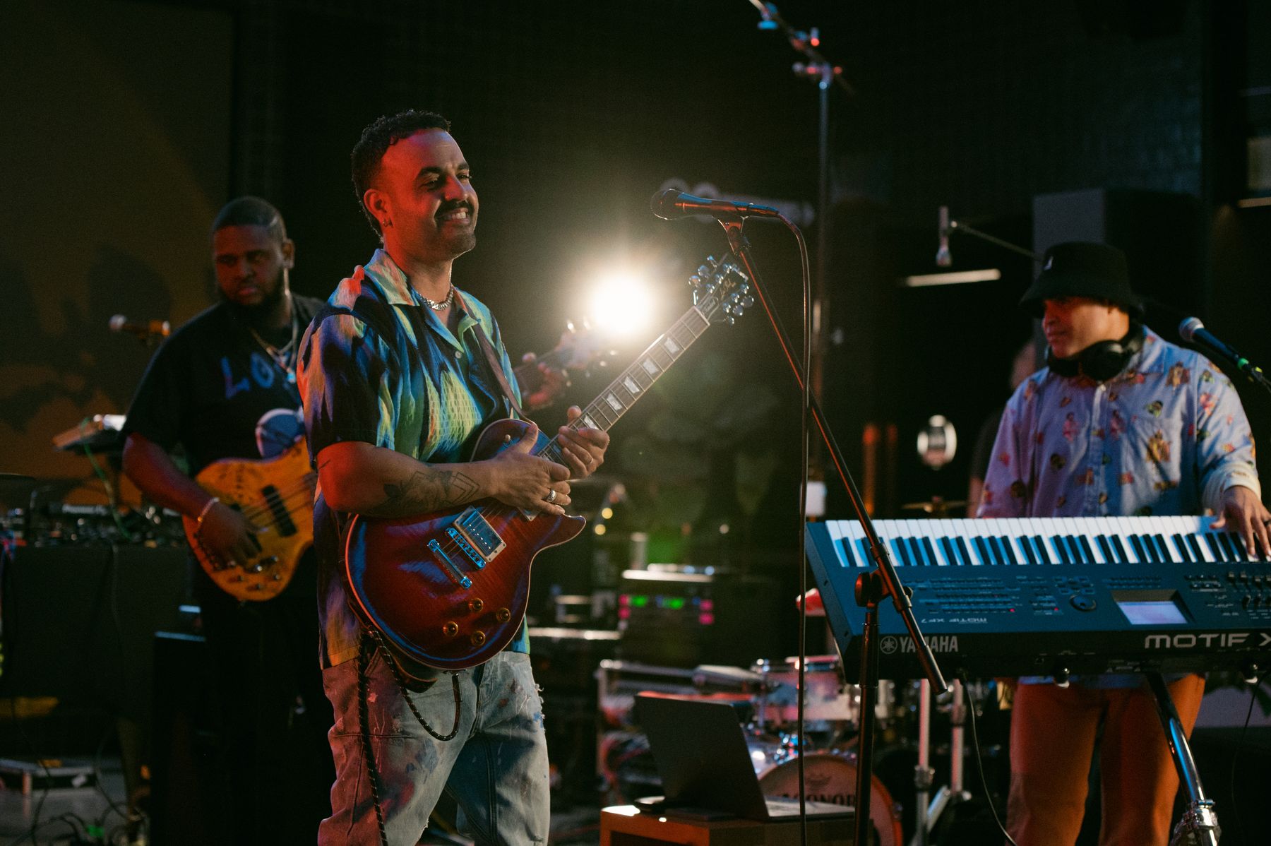 A band on stage in Miami, guitarist at the front